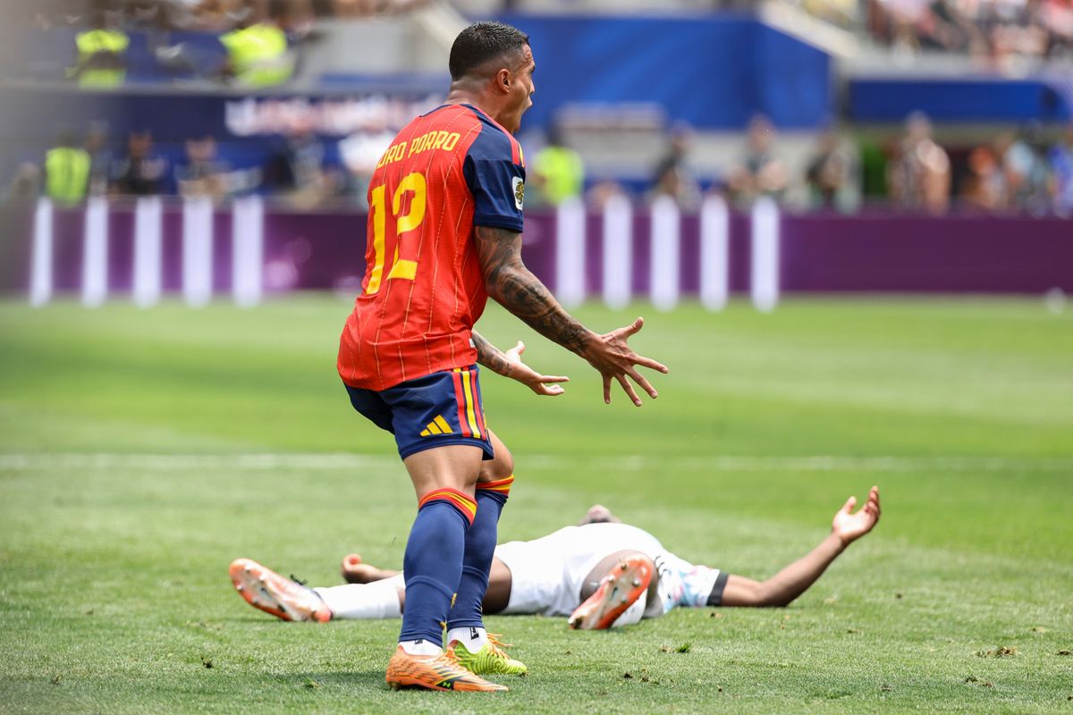 Pedro Porro #12 of Spain reacts to a foul call as Jérémy Doku #11 of Belgium lays on the ground during a 2026 FIFA World Cup match, Friday July 10, 2026 in Inglewood, Calif. Pedro Porro #12 of Spain reacts to a foul call as Jérémy Doku #11 of Belgium lays on the ground during a 2026 FIFA World Cup match, Friday July 10, 2026 in Inglewood, Calif.