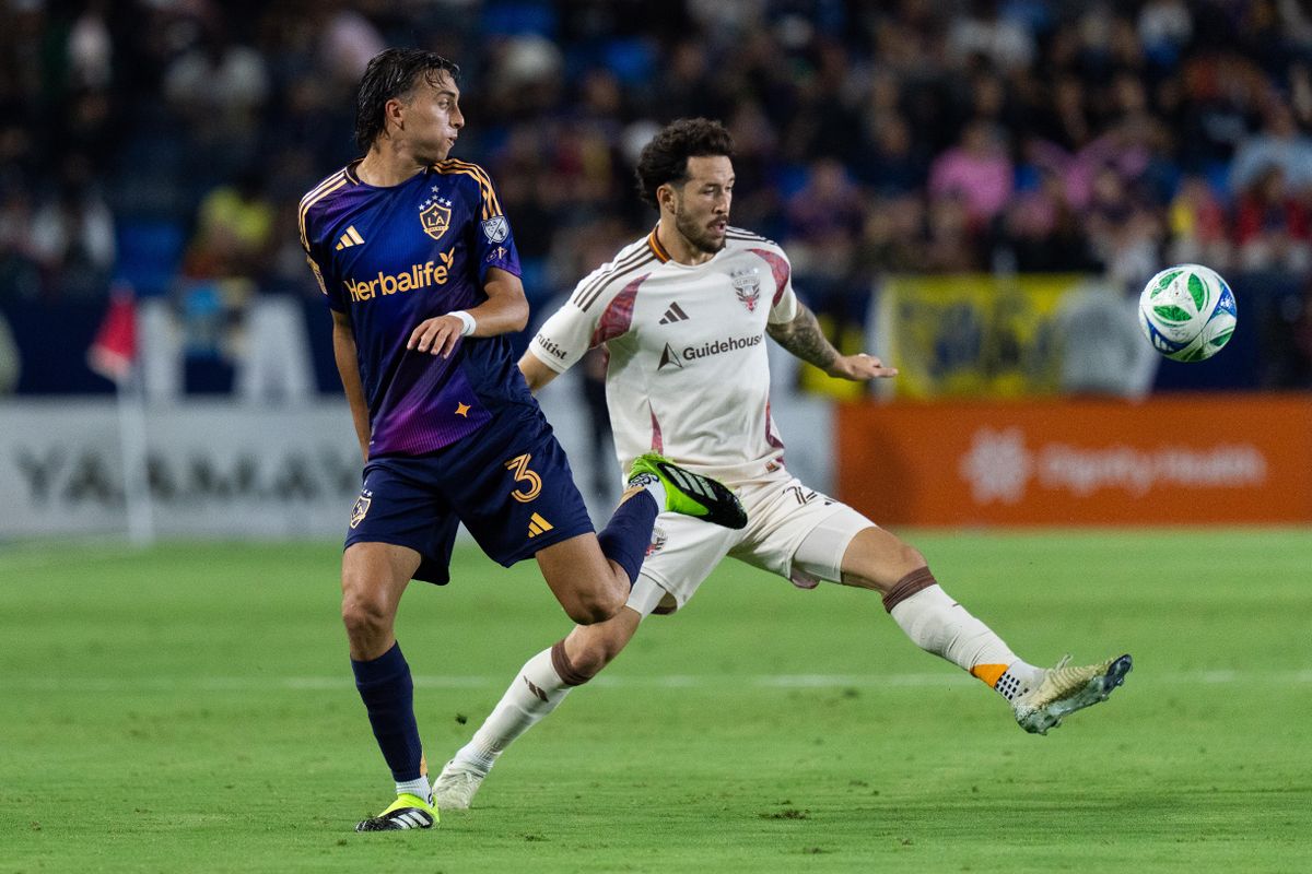 Los Angeles Galaxy defencer Julian Aude (3) back heels a pass during an MLS match against D.C. United, Saturday July 12, 2025 in Carson, Calif.