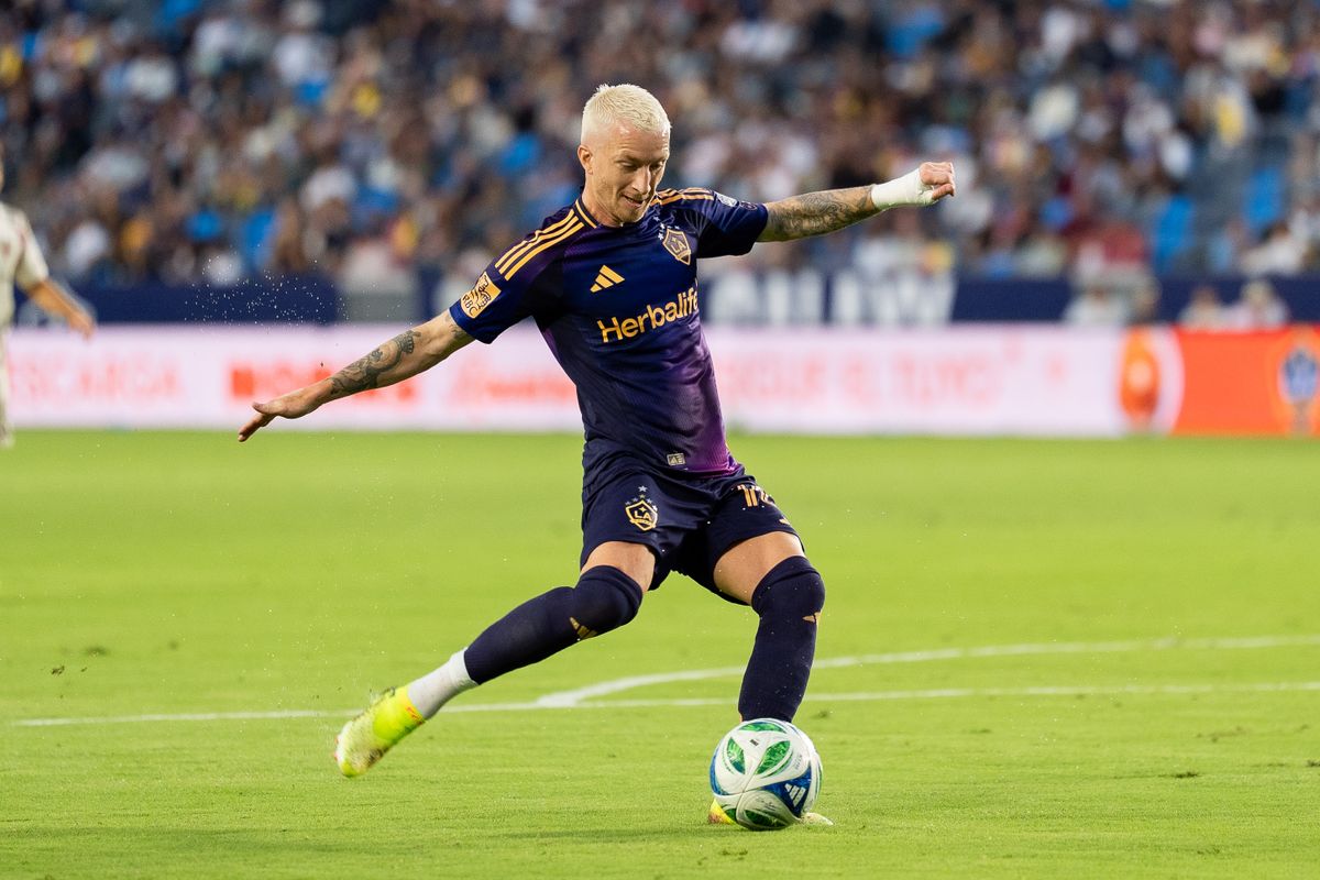 Los Angeles Galaxy midfielder Marco Reus (18) takes a shot on goal during an MLS match against D.C. United, Saturday July 12, 2025 in Carson, Calif.