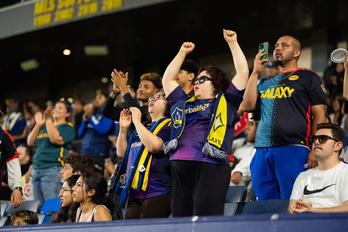 Los Angeles Galaxy fans celebrate a goal during an MLS match against D.C. United, Saturday July 12, 2025 in Carson, Calif.