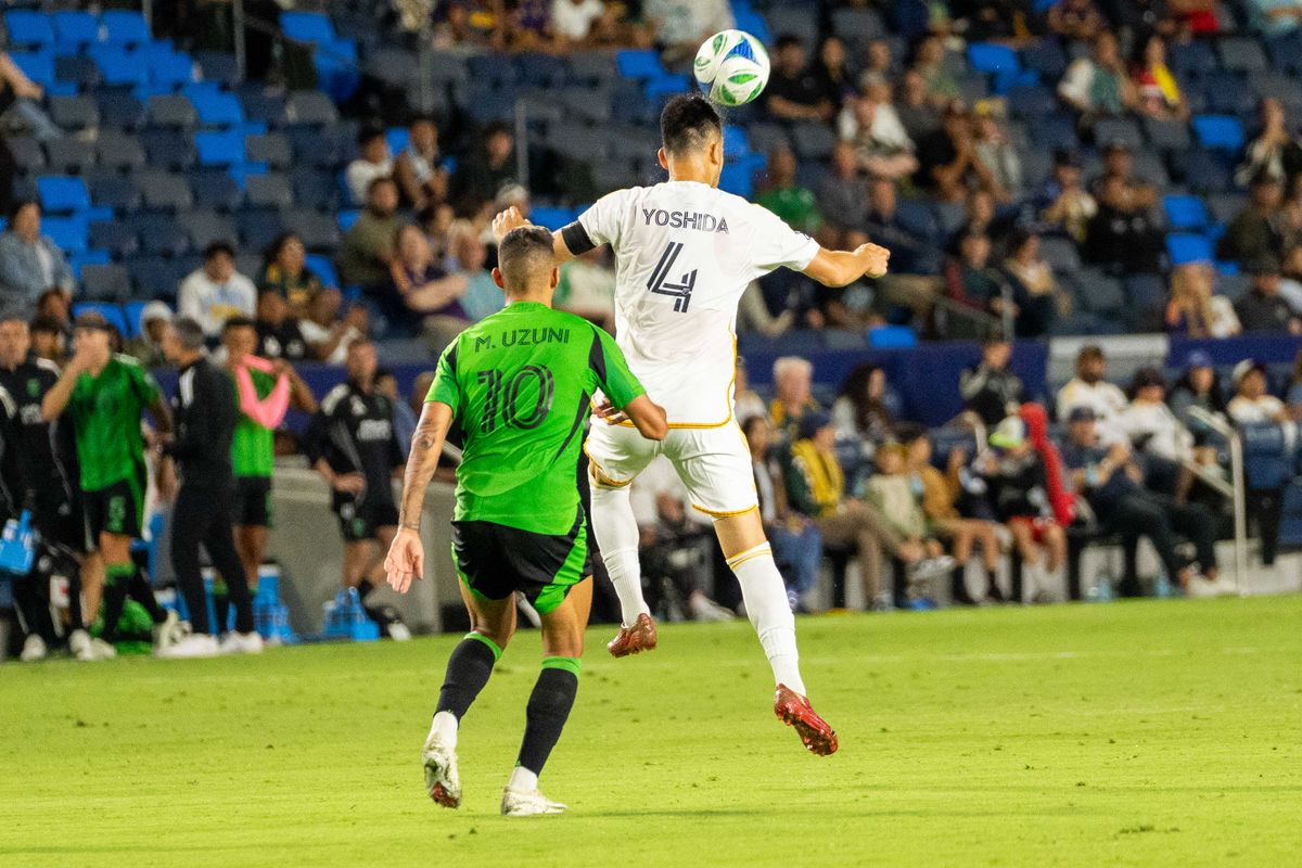 LA Galaxy center back Maya Yoshida (4) takes a header at an MLS game against Austin FC on July 16th, 2025 in Carson, California