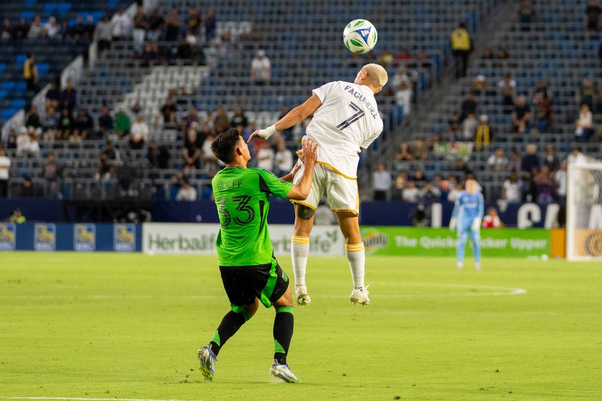 LA Galaxy central midfielder Diego Fagundez (7) takes a header at an MLS game against Austin FC on July 16th, 2025 in Carson, California