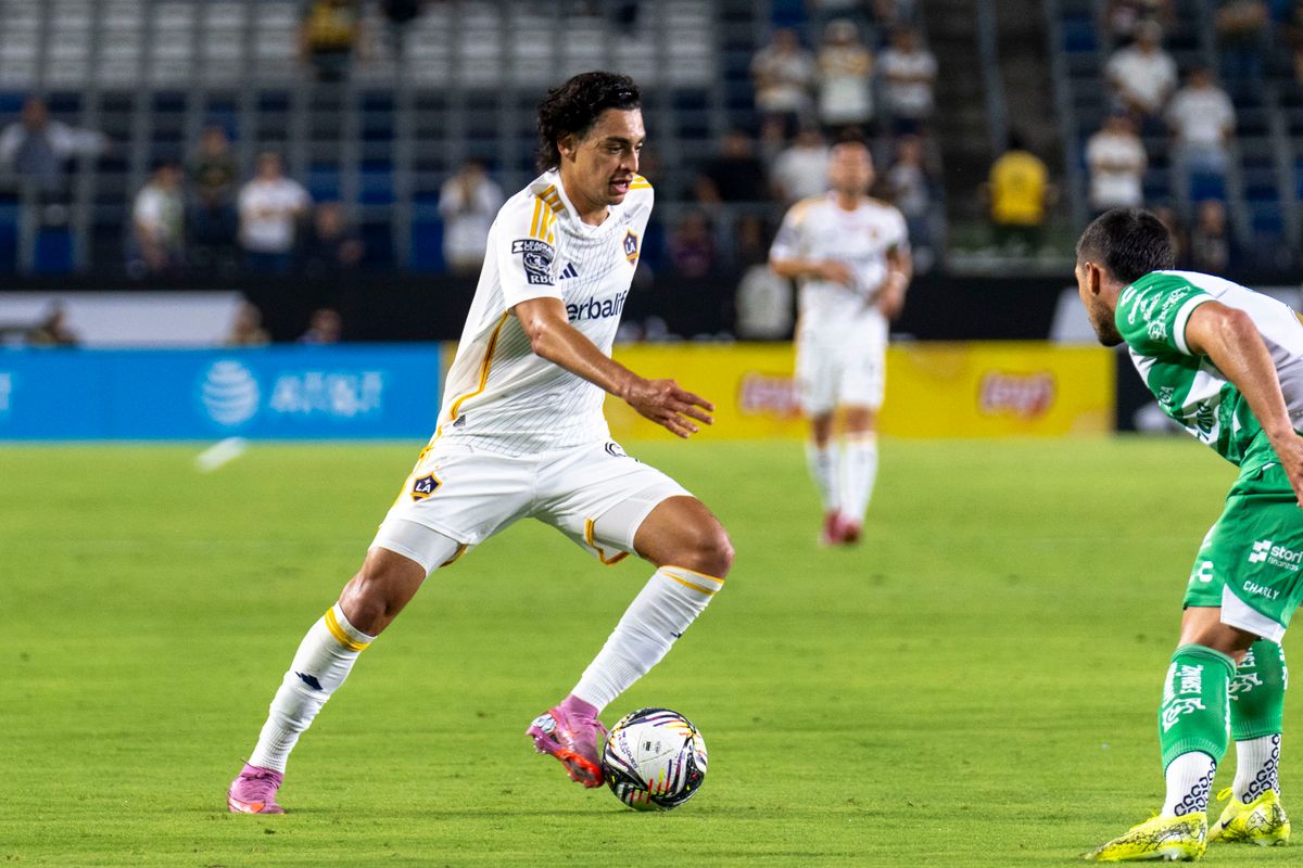 Los Angeles Galaxy forward Matheus Nascimento (9) attacks the defense during the Leagues Cup game against Santos Laguna, Thursday August 7th, 2025 in Carson, California. 