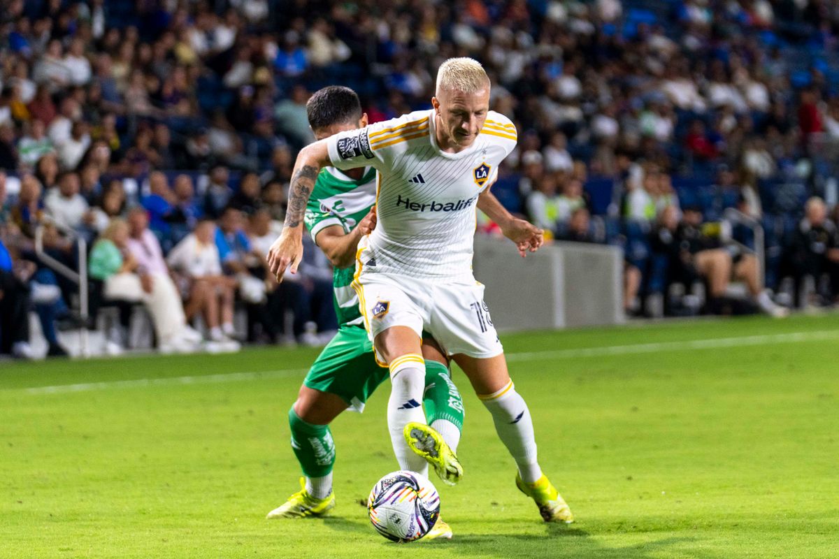 Los Angeles Galaxy midfielder Marco Reus (18) fights for the ball during the Leagues Cup game against Santos Laguna, Thursday August 7th, 2025 in Carson, California. 