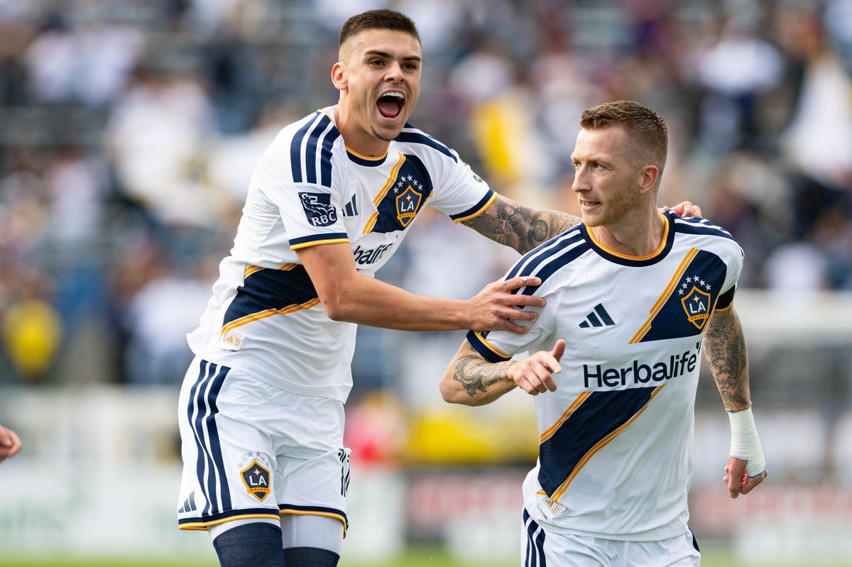 LA Galaxy midfielder Marco Reus (18) celebrates with forward Gabriel Pec (11) after scoring a goal during a match between Real Salt Lake and LA Galaxy on Sunday, April 26, at Dignity Health Sports Park in Carson California