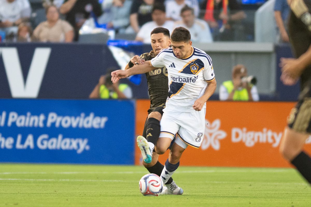 LAFC midfielder Mark Delgado (8) attempts to tackle the ball away from LA Galaxy midfielder Lucas Sanabria (8) during an MLS match between LAFC and LA Galaxy on Friday, July 17, 2026 at Dignity Health Sports Park in Carson, Calif LAFC midfielder Mark Delgado (8) attempts to tackle the ball away from LA Galaxy midfielder Lucas Sanabria (8) during an MLS match between LAFC and LA Galaxy on Friday, July 17, 2026 at Dignity Health Sports Park in Carson, Calif