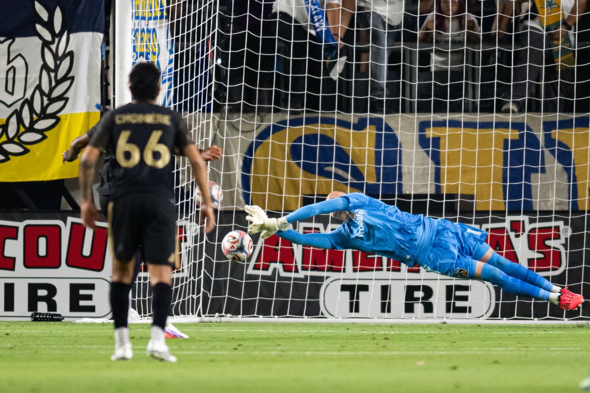 LA Galaxy goalkeeper Novak Mićović (1) jumps right but misses a save from a penalty kick from LAFC forward Denis Bouanga (99) during an MLS match between LAFC and LA Galaxy on Friday, July 17, 2026 at Dignity Health Sports Park in Carson, Calif LA Galaxy goalkeeper Novak Mićović (1) jumps right but misses a save from a penalty kick from LAFC forward Denis Bouanga (99) during an MLS match between LAFC and LA Galaxy on Friday, July 17, 2026 at Dignity Health Sports Park in Carson, Calif