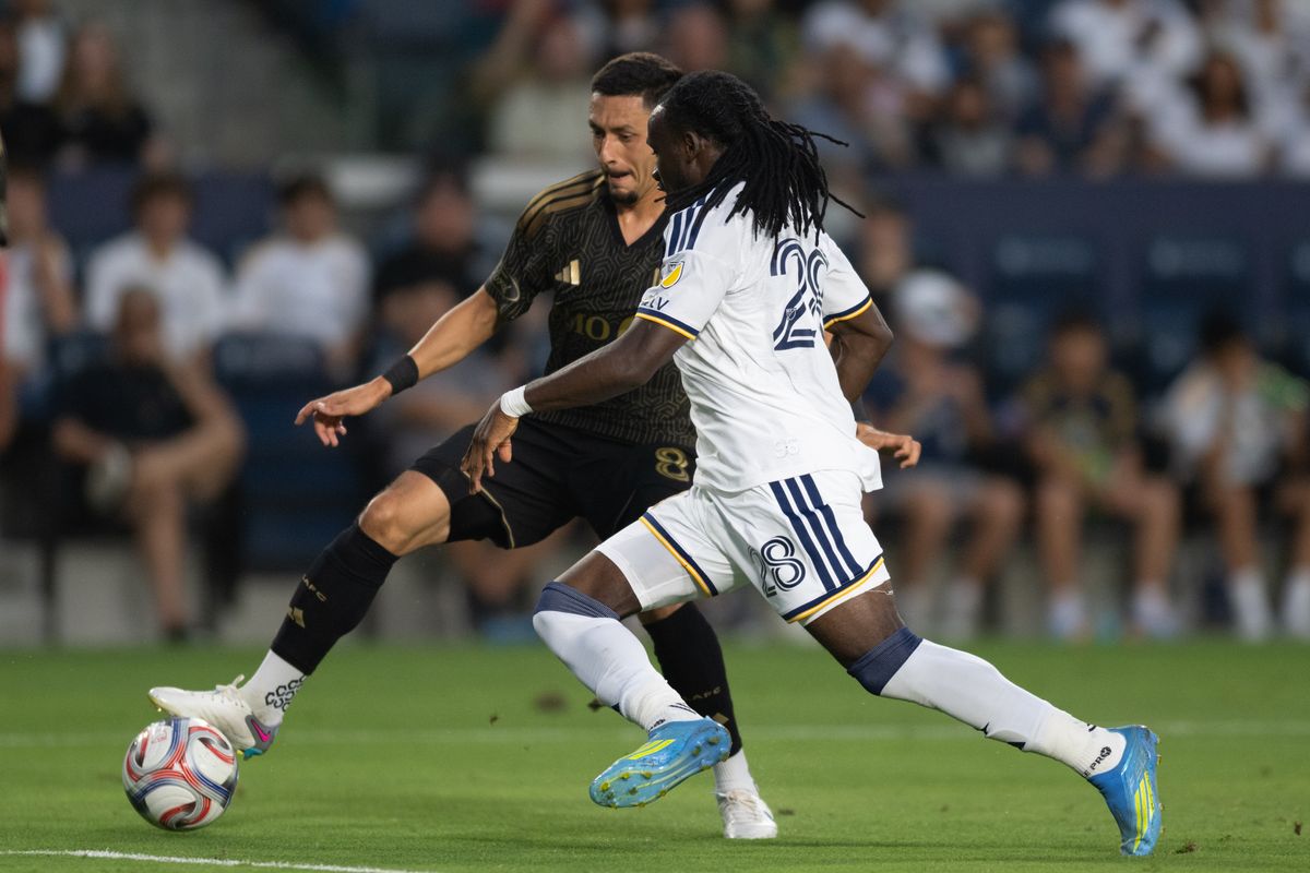 LAFC midfielder Mark Delgado (8) battles for possession against LA Galaxy forward Joseph Paintsil (28) during an MLS match between LAFC and LA Galaxy on Friday, July 17, 2026 at Dignity Health Sports Park in Carson, Calif LAFC midfielder Mark Delgado (8) battles for possession against LA Galaxy forward Joseph Paintsil (28) during an MLS match between LAFC and LA Galaxy on Friday, July 17, 2026 at Dignity Health Sports Park in Carson, Calif