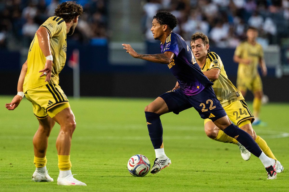 Los Angeles Galaxy midfielder Elijah Wynder (22) makes a save during an MLS game, against St. Louis City SC on Wednesday July 22nd, 2026 in Carson, Calif