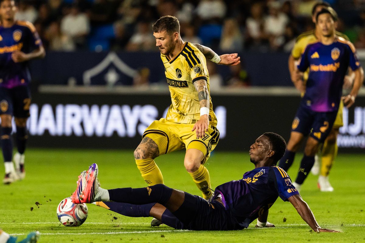Los Angeles Galaxy defender Emiro Garces (25) goes for a tackle during an MLS game, against St. Louis City SC on Wednesday July 22nd, 2026 in Carson, Calif