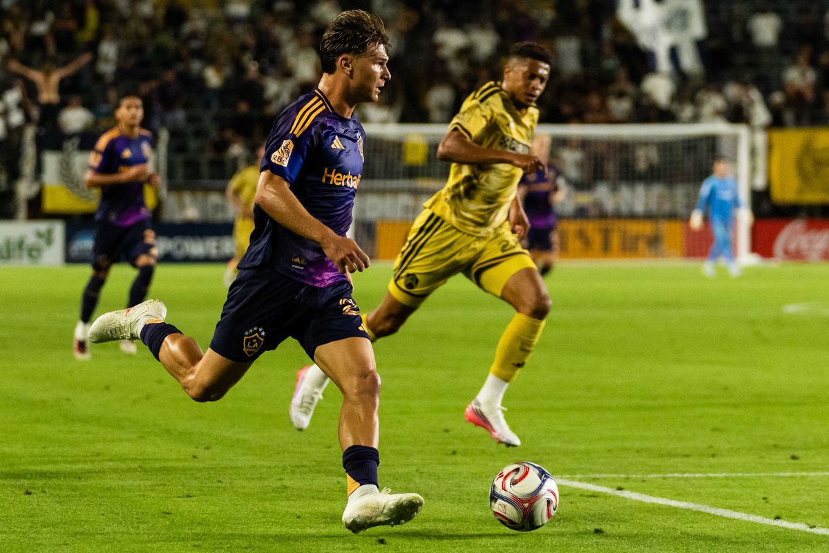Los Angeles Galaxy defender Harbor Miller (26) looks for the open teammate during an MLS game, against St. Louis City SC on Wednesday July 22nd, 2026 in Carson, Calif