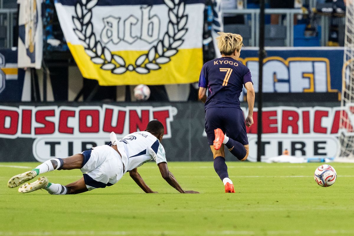 Los Angeles Galaxy forward Kyogo Kuruhashi (7) gets past his opponent during an MLS game, against the New England Revolution on Saturday September 5th, 2026 in Carson, Calif