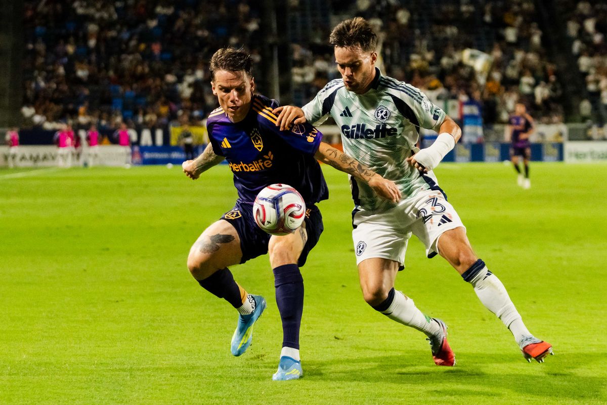 Los Angeles Galaxy forward Robert Taylor (21) fights for possession during an MLS game, against the New England Revolution on Saturday September 5th, 2026 in Carson, Calif