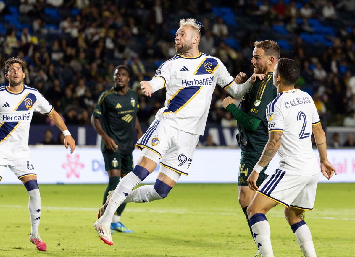 Los Angeles Galaxy forward Joao Klauss (99) jumps for the ball during a MLS soccer game against Portland Timbers, Wednesday October 14, 2026 in Carson, California. Los Angeles Galaxy forward Joao Klauss (99) jumps for the ball during a MLS soccer game against Portland Timbers, Wednesday October 14, 2026 in Carson, California.