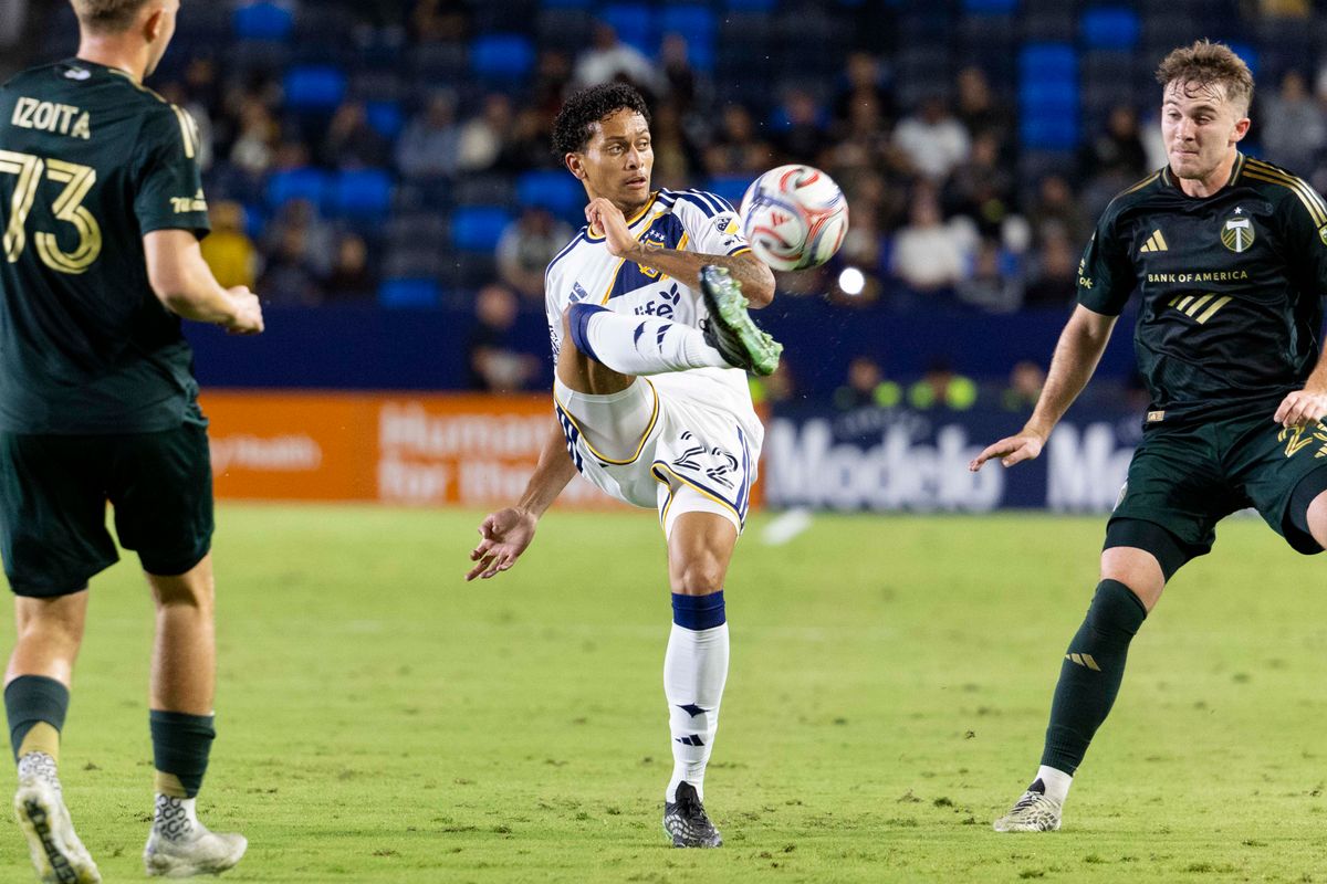 Los Angeles Galaxy midfielder Elijah Wynder (22) kicks the ball during a MLS soccer game against Portland Timbers, Wednesday October 14, 2026 in Carson, California. Los Angeles Galaxy midfielder Elijah Wynder (22) kicks the ball during a MLS soccer game against Portland Timbers, Wednesday October 14, 2026 in Carson, California.