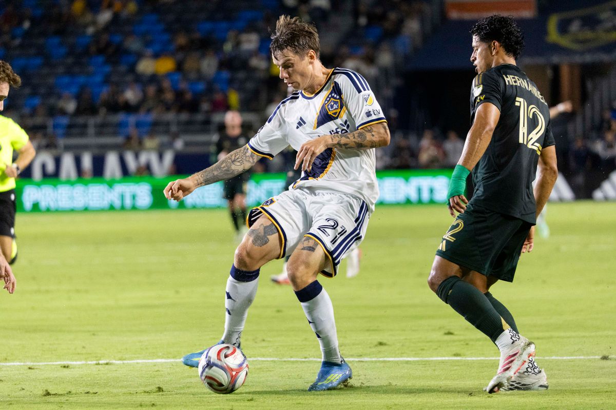 Los Angeles Galaxy forward Robert Taylor (21) run with the ball during a MLS soccer game against Portland Timbers, Wednesday October 14, 2026 in Carson, California. Los Angeles Galaxy forward Robert Taylor (21) run with the ball during a MLS soccer game against Portland Timbers, Wednesday October 14, 2026 in Carson, California.