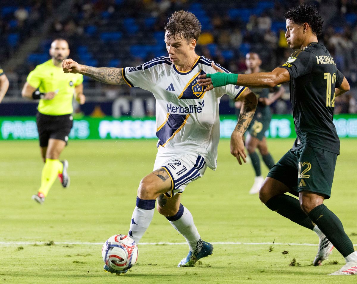Los Angeles Galaxy forward Robert Taylor (21) run with the ball during a MLS soccer game against Portland Timbers, Wednesday October 14, 2026 in Carson, California. Los Angeles Galaxy forward Robert Taylor (21) run with the ball during a MLS soccer game against Portland Timbers, Wednesday October 14, 2026 in Carson, California.