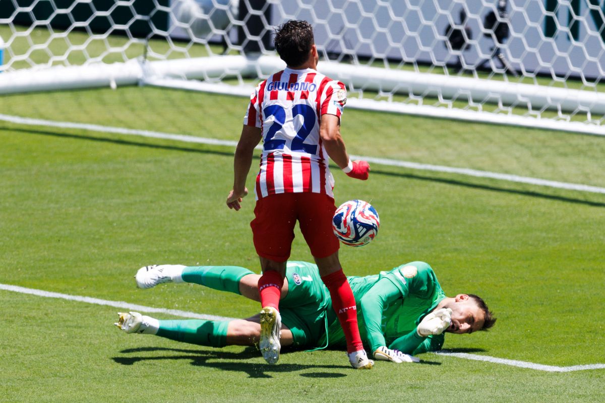 Gianluigi Donnarumma #1 makes a save against Giuliano Simeone #22 during the FIFA Club World Cup 2025 group B match between Paris Saint-Germain FC and Club Atletico de Madrid at Rose Bowl Stadium on June 15, 2025 in Pasadena, California.