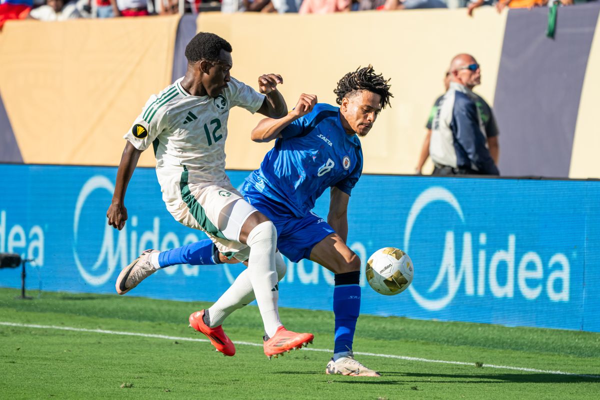 Players from Haiti and Saudi Arabia's national team battling it out for ball possession during a Gold Cup Match on June 15, 2025 in San Diego, CA