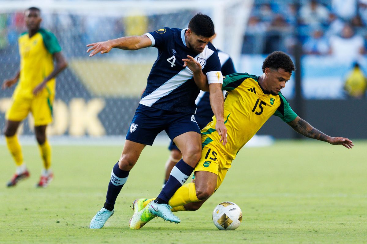 Jose Pinto #4 of Guatemala and J. Latibeaudiere #15 of Jamaica battle for the ball during the Group Stage - Group C match as part of the 2025 CONCACAF Gold Cup at Dignity Health Sports Park on June 16, 2025 in Carson, California.