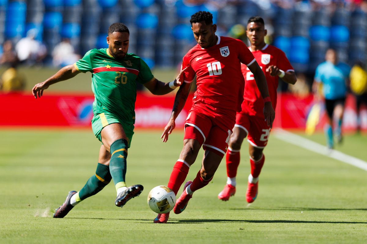 Guadeloupe defender Yvann Maçon #26 and Panama forward Ismael Díaz #10 battle for the ball during the Group Stage - Group C match as part of the 2025 CONCACAF Gold Cup at Dignity Health Sports Park on June 16, 2025 in Carson, California.