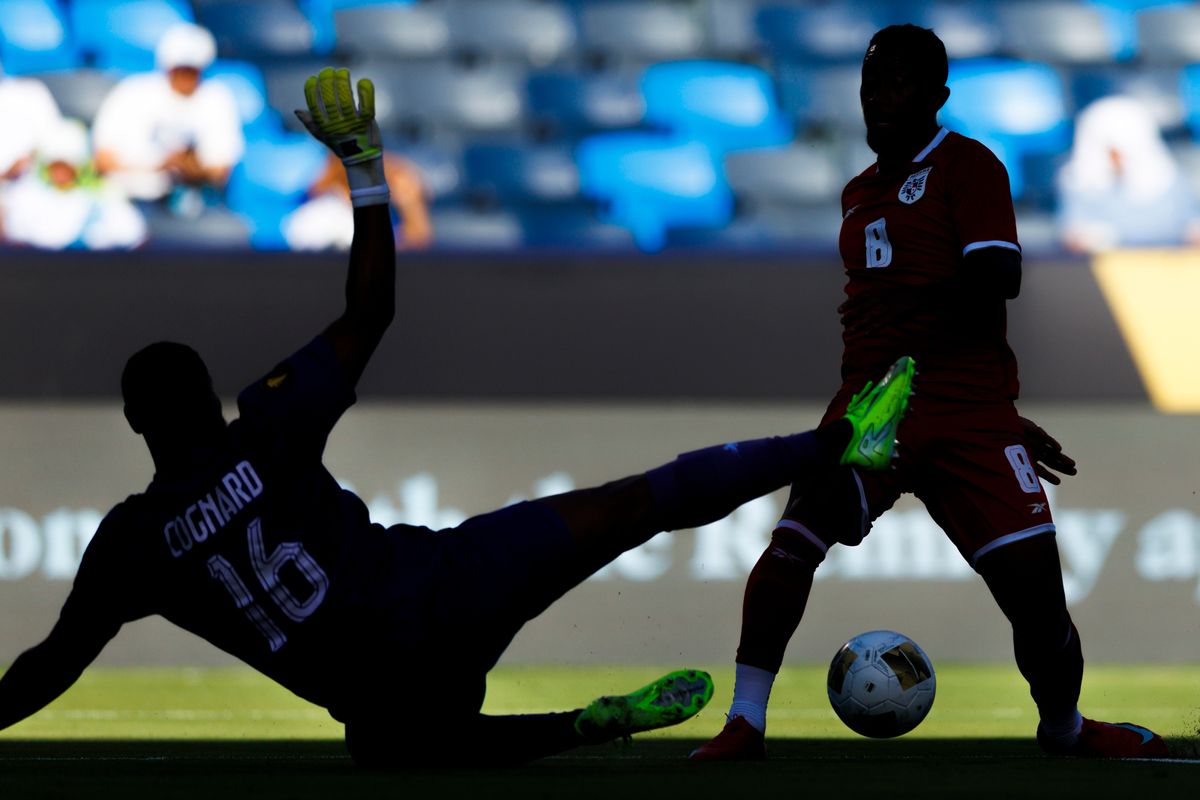 Guadeloupe goalkeeper Brice Cognard #16 blocks the shot by Panama midfielder Victor Griffith #8 during the Group Stage - Group C match as part of the 2025 CONCACAF Gold Cup at Dignity Health Sports Park on June 16, 2025 in Carson, California.