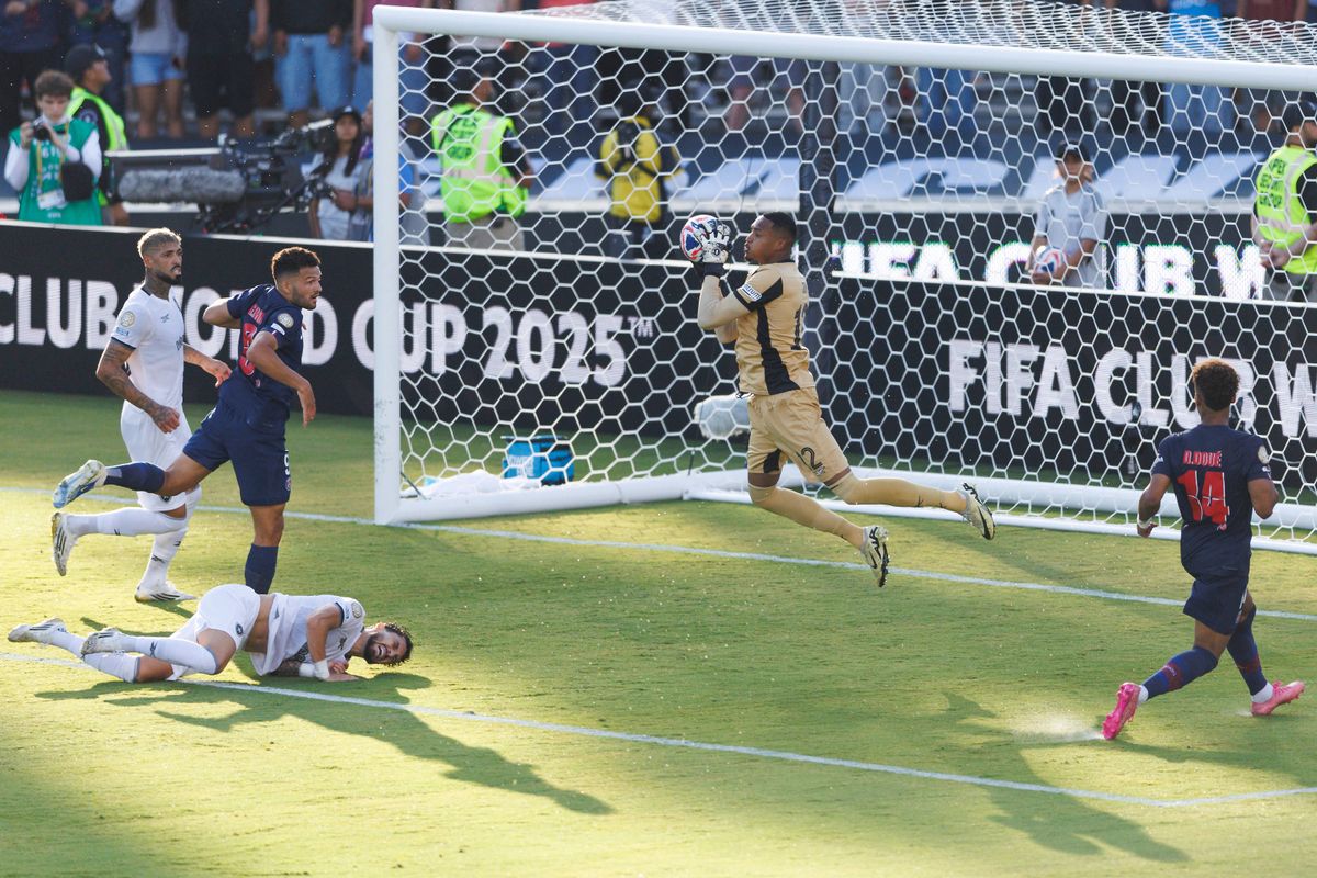 Botafogo goalkeeper John (12) makes a save during the FIFA Club World Cup 2025 group B match against Paris Saint-Germain at Rose Bowl Stadium on June 19, 2025 in Pasadena, California.