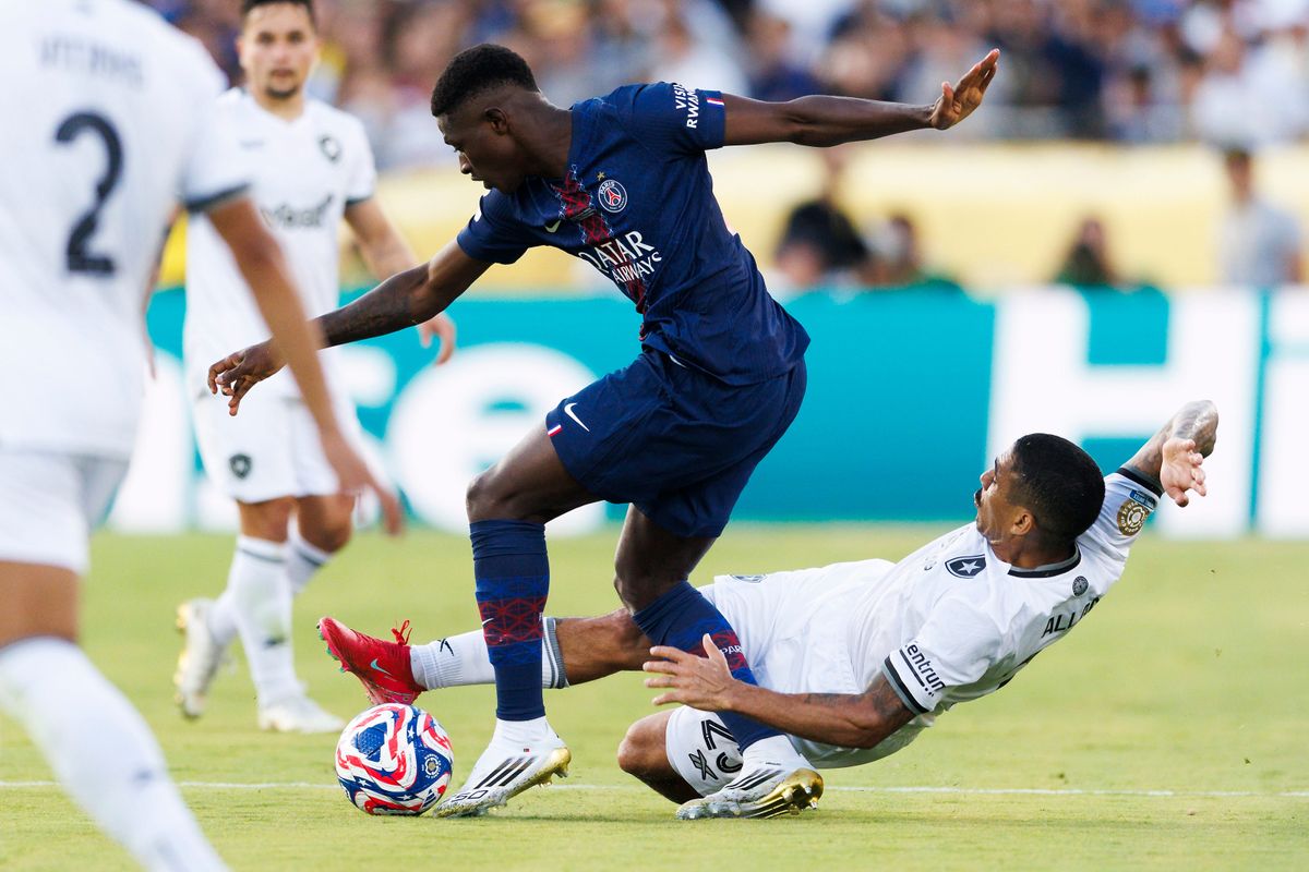 Botafogo midfielder Allan (25) slide tackles during the FIFA Club World Cup 2025 group B match against Paris Saint-Germain at Rose Bowl Stadium on June 19, 2025 in Pasadena, California.