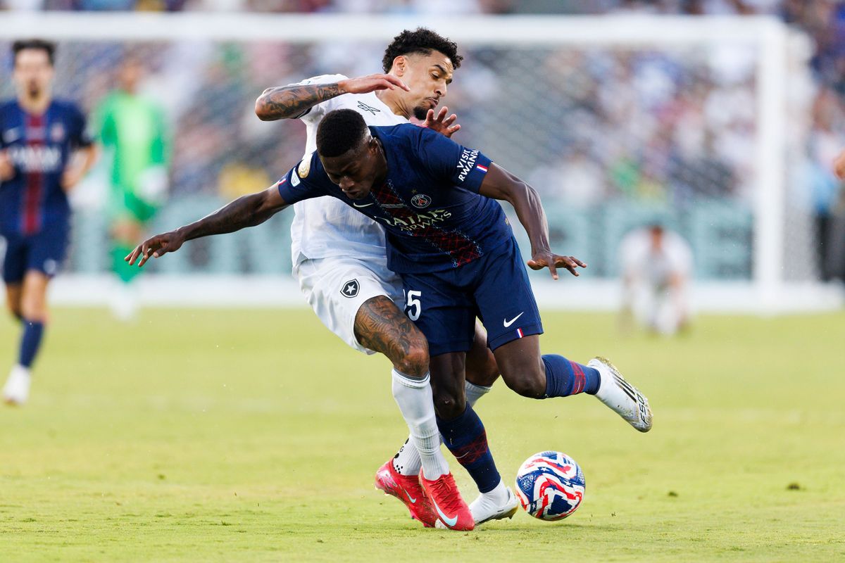 Paris Saint-Germain defender Nuno Mendes (25) dribbles the ball during the FIFA Club World Cup 2025 group B match against Botafogo at Rose Bowl Stadium on June 19, 2025 in Pasadena, California. 