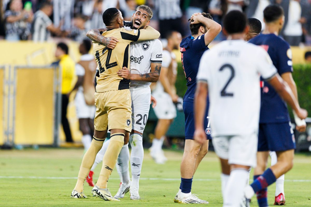Botafogo goalkeeper John (12) celebrates with Botafogo defender Alexander Barboza (20) after the FIFA Club World Cup 2025 group B match against Paris Saint-Germain at Rose Bowl Stadium on June 19, 2025 in Pasadena, California.