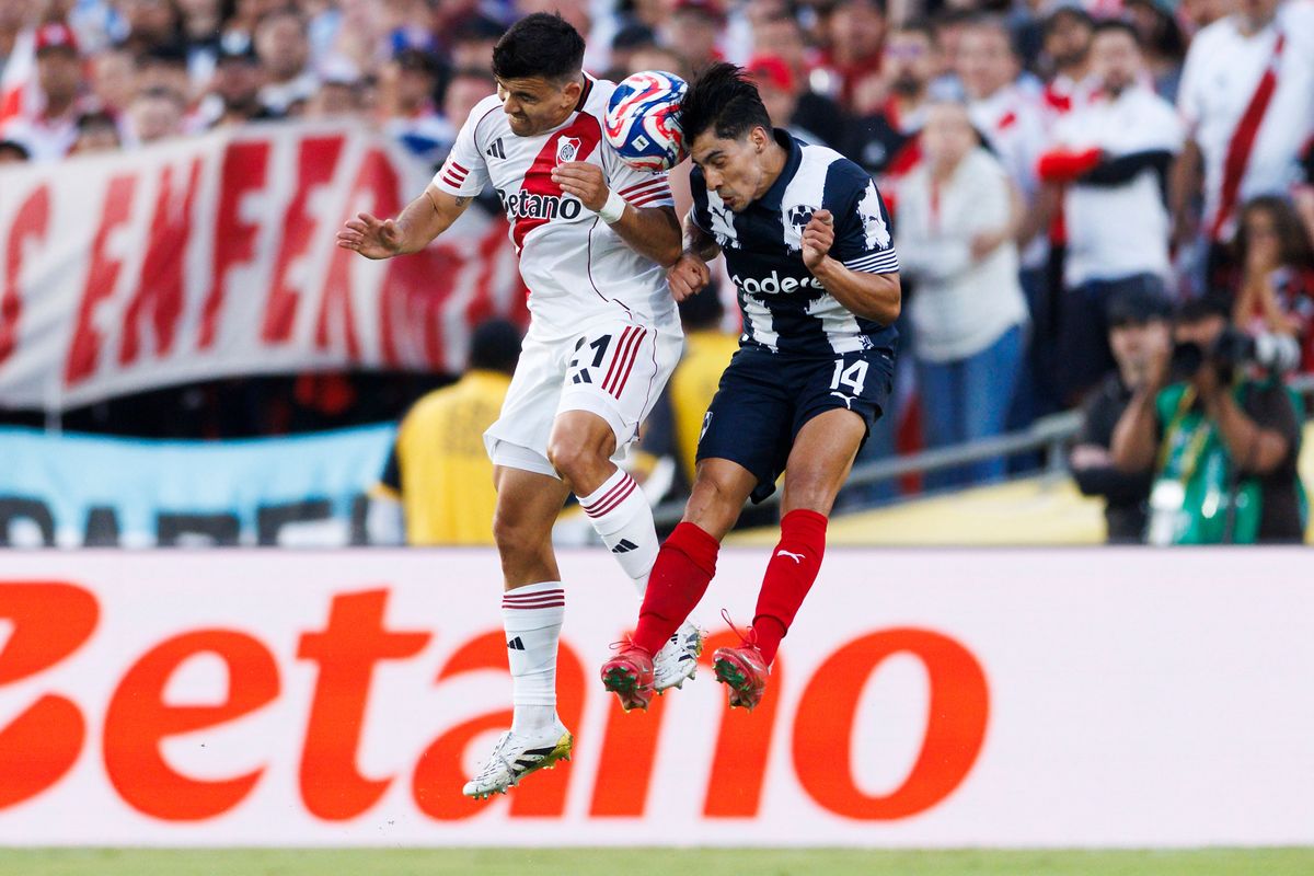 Marcos Acuña #21 of River Plate and Erick Aguirre #14 of Monterrey head the ball during the FIFA Club World Cup 2025 group match at Rose Bowl Stadium on June 21, 2025 in Pasadena, California. Marcos Acuña #21 of River Plate and Erick Aguirre #14 of Monterrey head the ball during the FIFA Club World Cup 2025 group match at Rose Bowl Stadium on June 21, 2025 in Pasadena, California.