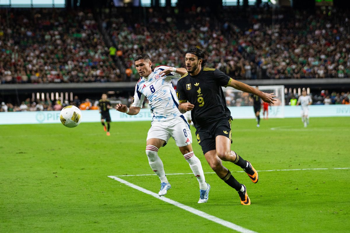Mexico forward Raul Jimenez (9) and Costa Rica defender Joseph Mora (8) both chase after the ball during a Concacaf Gold Cup match between Mexico and Costa Rica, Sunday June 22, 2025 in Las Vegas, Nev.