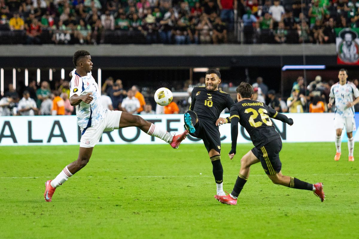 Costa Rica defender Jeyland Mitchell (3) and Mexico forward Alexis Vega (10) both go for the ball in mid-air during a Concacaf Gold Cup match between Mexico and Costa Rica, Sunday June 22, 2025 in Las Vegas, Nev.