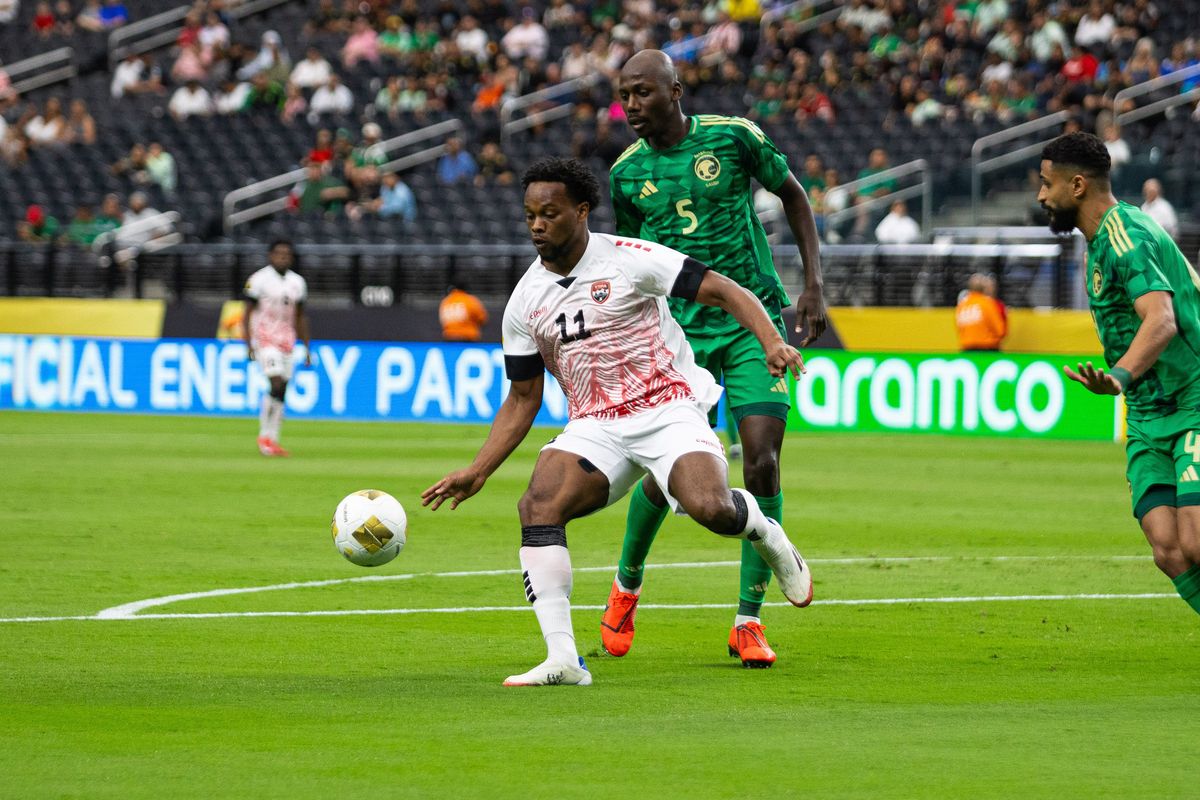 Trinidad and Tobago forward Levi Garcia (11) controls a pass in the box as Saudi Arabia defender Abdullah Madu (5) defends during a Concacaf Gold Cup match between Saudi Arabia and Trinidad and Tobago, Sunday June 22, 2025 in Las Vegas, Nev.