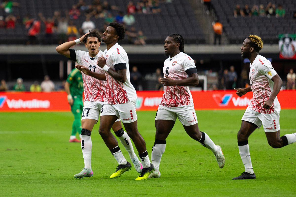 Trinidad and Tobago forward Dante Sealy (15) celebrates with teammates after scoring during a Concacaf Gold Cup match between Saudi Arabia and Trinidad and Tobago, Sunday June 22, 2025 in Las Vegas, Nev.