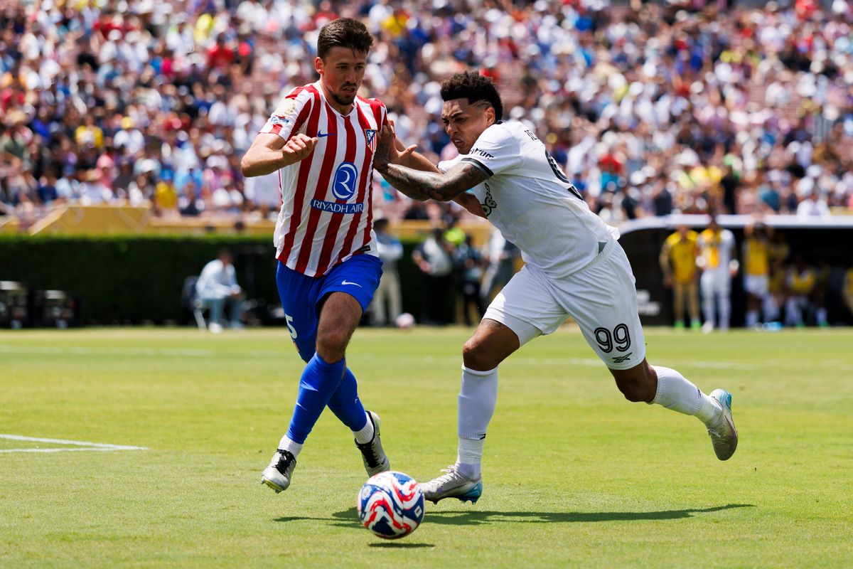 Clément Lenglet #15 of Atlético Madrid and Igor Jesus #99 of Botafogo battle for position during the FIFA Club World Cup 2025 group B match at Rose Bowl Stadium on June 23, 2025 in Pasadena, California. 