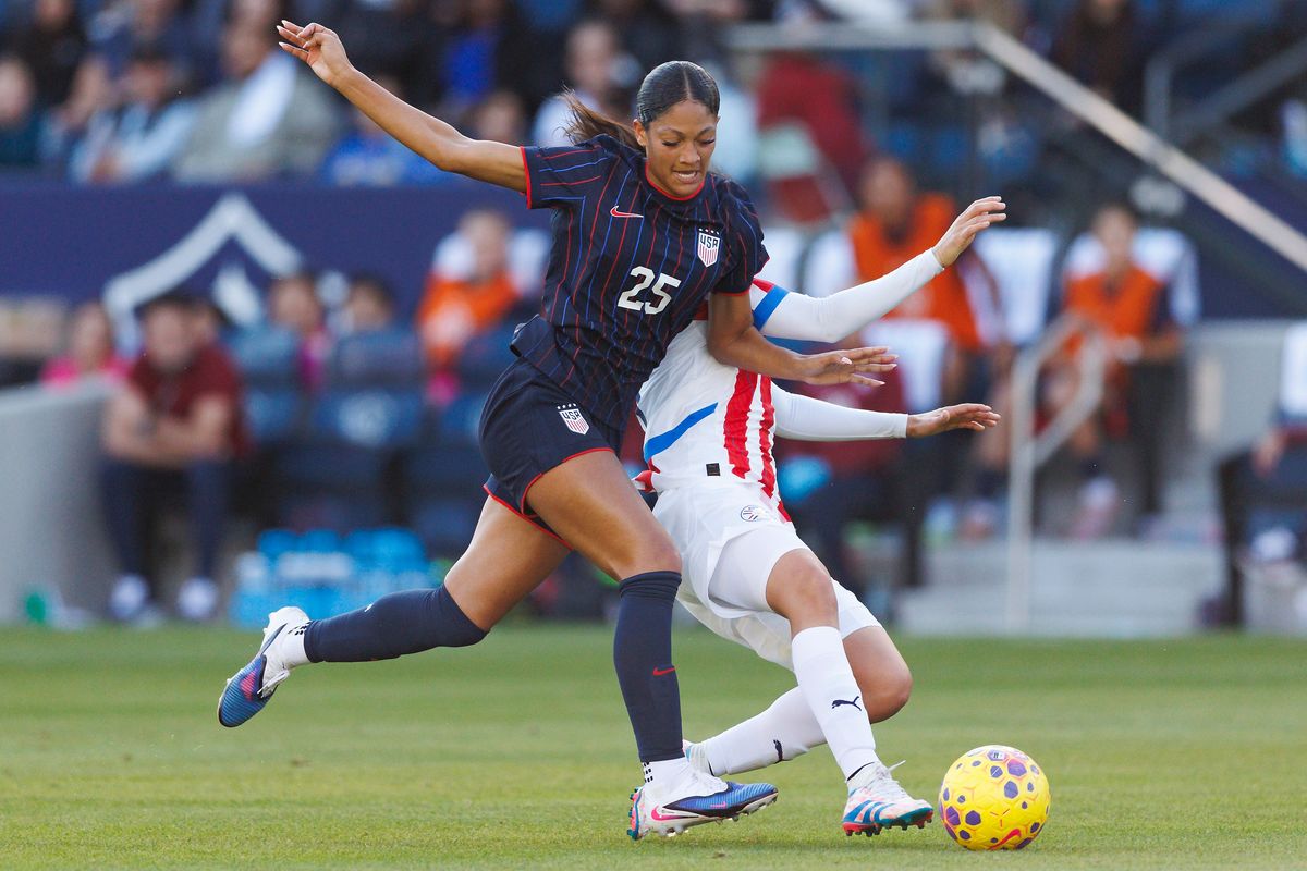 Reilyn Turner #25 of USWNT battles for control during the game against Paraguay at Dignity Health Sports Park on January 24, 2026 in Carson, California.