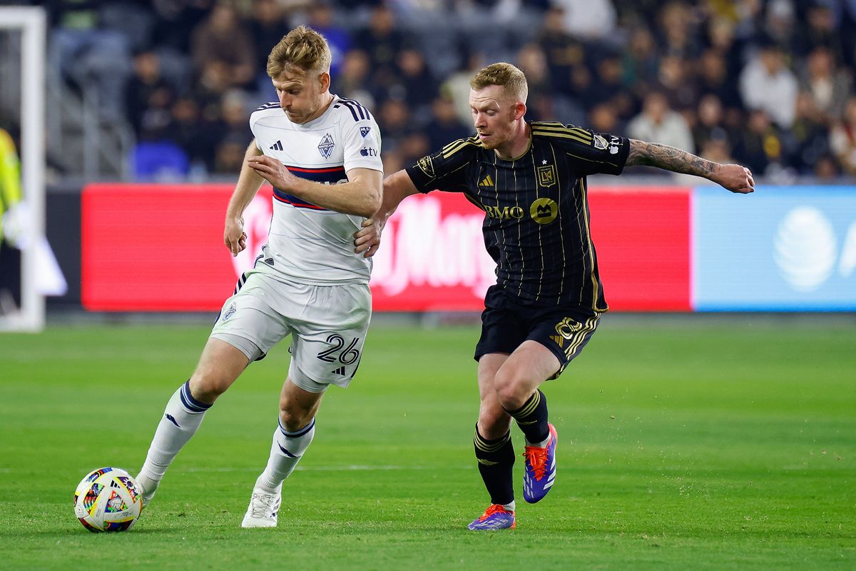 LAFC Midfielder Lewis O’Brien (8) attempts to retake possession during match against the Vancouver Whitecaps FC on Friday, November 8, 2024 in Los Angeles, CA. 