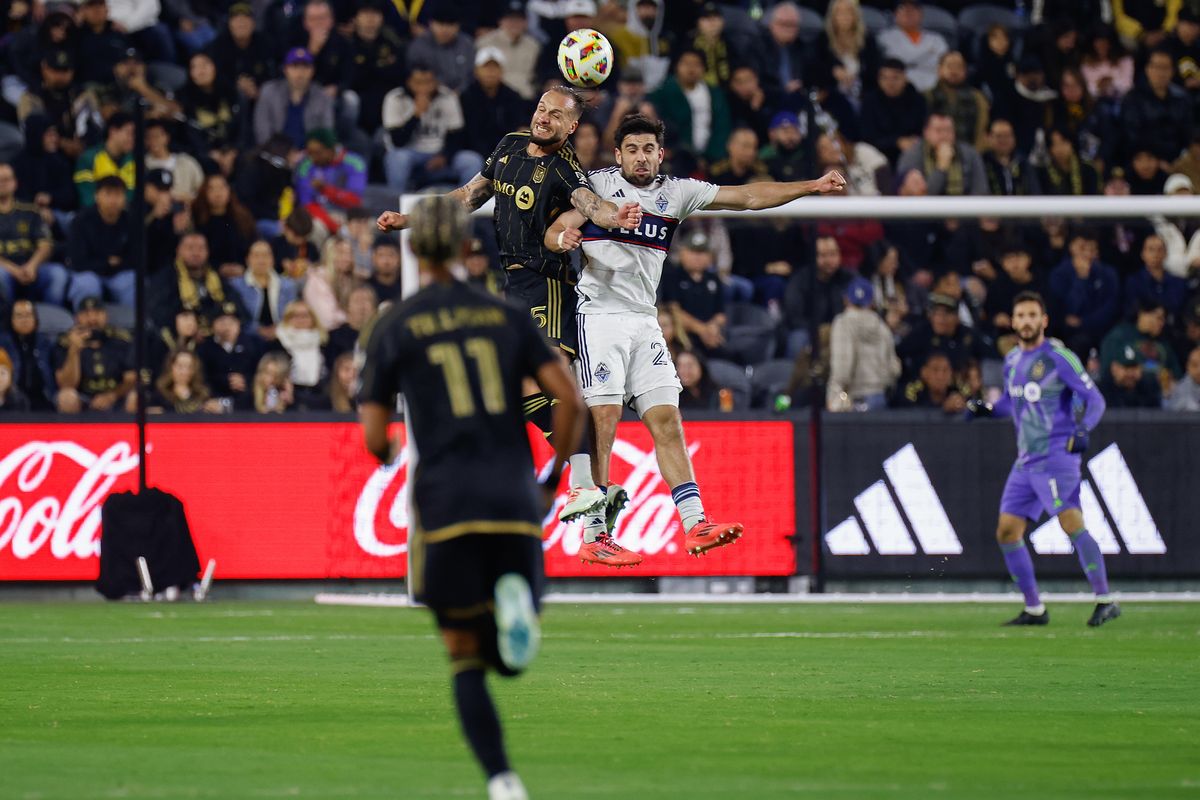 LAFC Defender Maxime Chanot (25) attempts a header against opponent during match against the Vancouver Whitecaps FC on Friday, November 8, 2024 in Los Angeles, CA. 