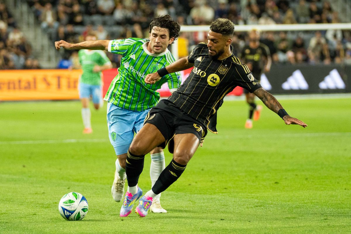 LAFC forward Denis Bouanga (99) fights for possession during an MLS game against the Seattle Sounders FC on Wednesday May 14th, 2025 in Los Angeles, California. 
