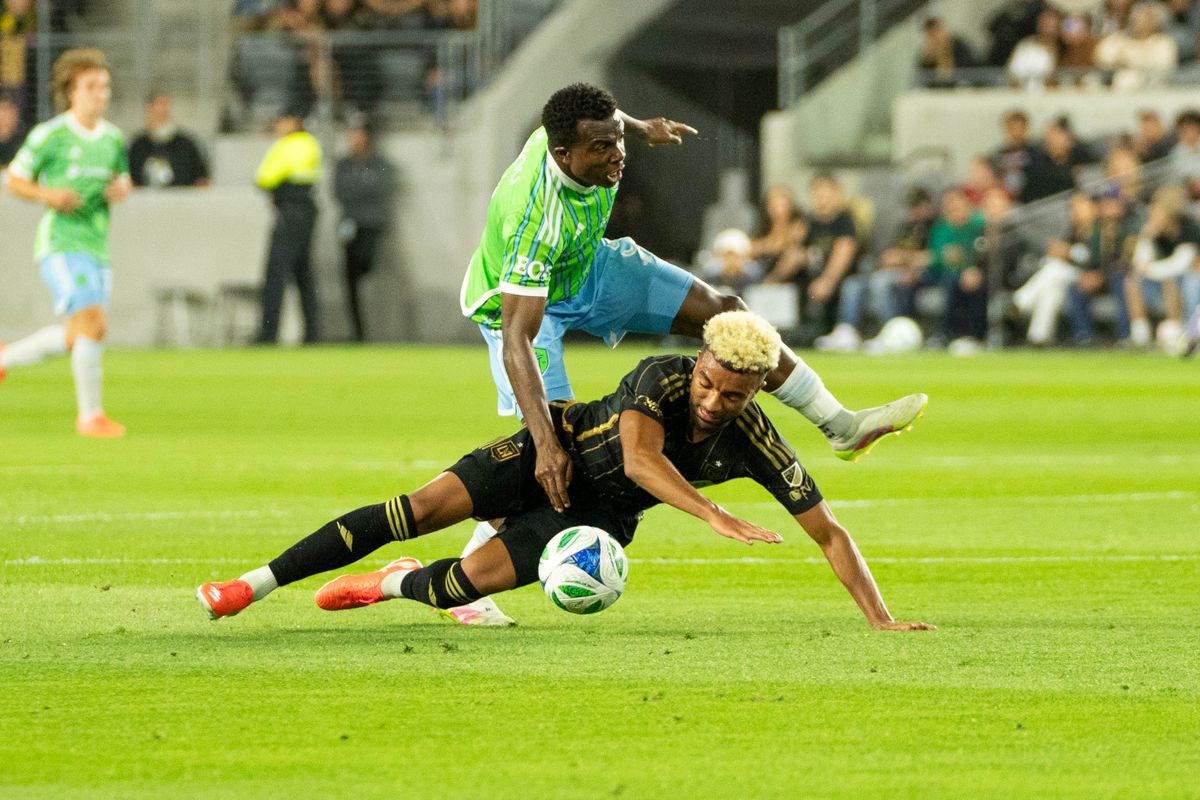 LAFC forward midfielder Timothy Tilman (11) fighting for possession during an MLS game against the Seattle Sounders FC on Wednesday May 14th, 2025 in Los Angeles, California. 