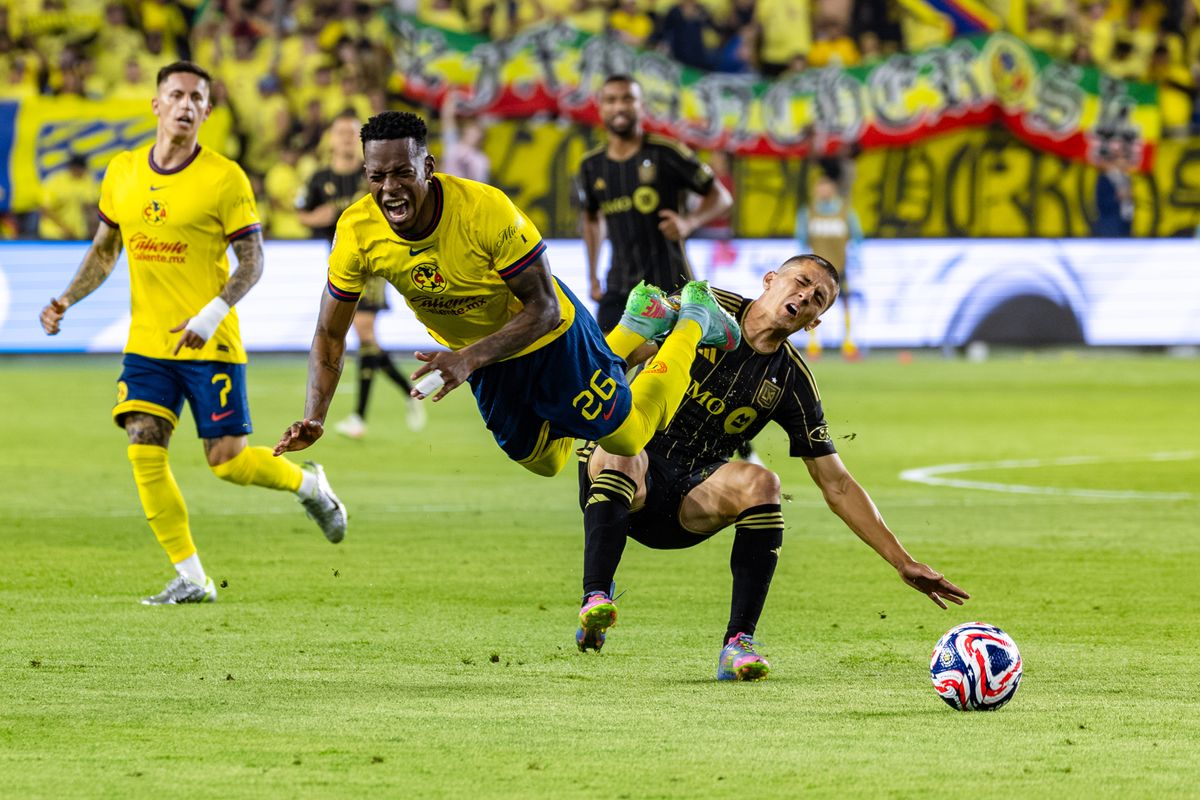 Club América midfielder Cristian Borja (26) and LAFC defender Sergi Palencia (14) collide during a FIFA Club World Cup play-in match, Saturday May 31, 2025 in Los Angeles, Calif.
