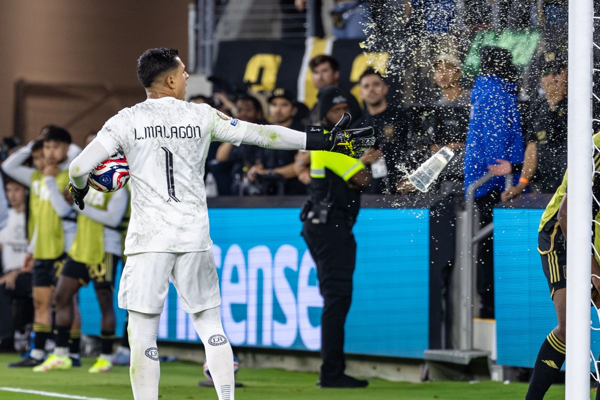 LAFC supporters throw beverage cups at Club América goalie Luis Malagon (1) during a FIFA Club World Cup play-in match, Saturday May 31, 2025 in Los Angeles, Calif.