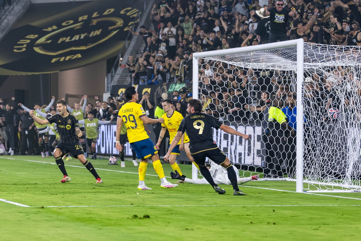 LAFC defender Ryan Hollingshead (24) and forward Olivier Giroud (9) celebrate an LAFC goal during a FIFA Club World Cup play-in match against Club América, Saturday May 31, 2025 in Los Angeles, Calif.