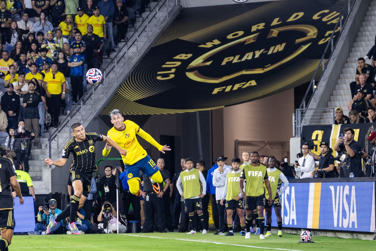 LAFC defender Sergi Palencia (14) and Club América defender Cristian Calderon compete for a ball during a FIFA Club World Cup play-in match, Saturday May 31, 2025 in Los Angeles, Calif.