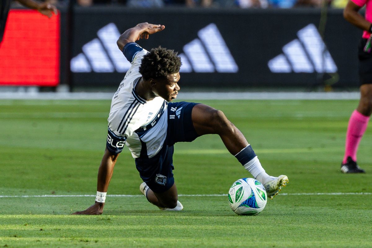 Vancouver Whitecaps forward Emmanuel Sabbi (11) slides for a ball during an MLS match against LAFC, Sunday June 29, 2025 in Los Angeles, Calif. Vancouver Whitecaps forward Emmanuel Sabbi (11) slides for a ball during an MLS match against LAFC, Sunday June 29, 2025 in Los Angeles, Calif.