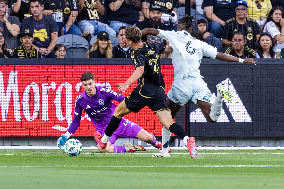 Colorado Rapids goalkeeper Nicolas Hansen (41) makes an early save during an MLS match against LAFC, Wednesday July 9, 2025 in Los Angeles, Calif.