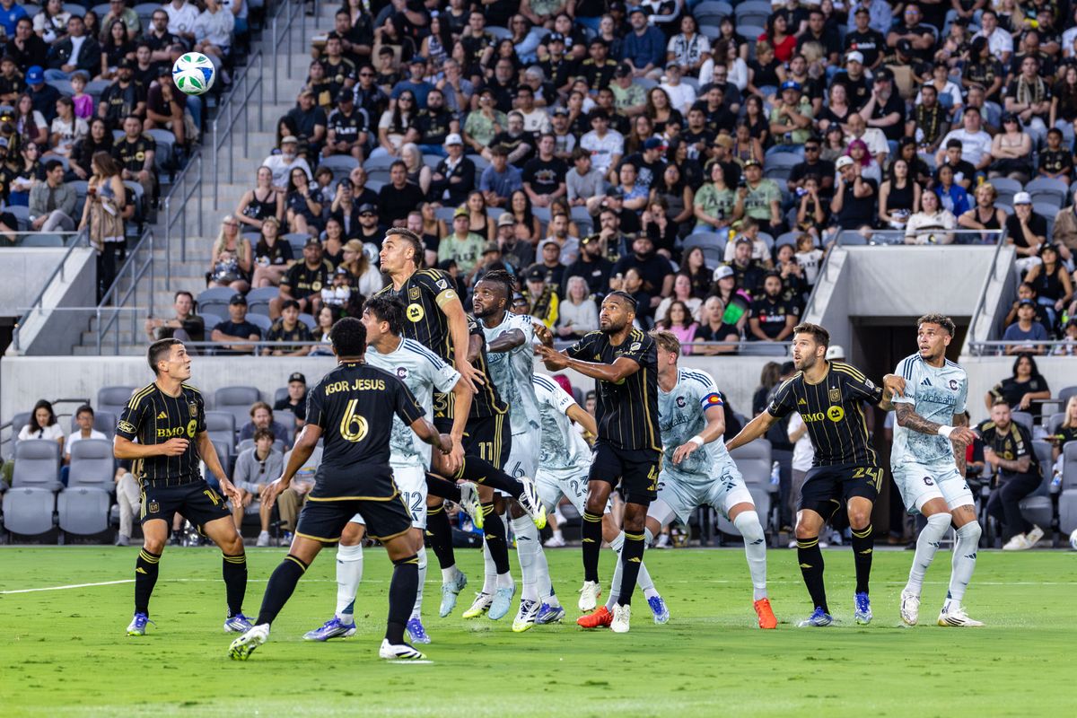 LAFC defender Aaron Long (33) rises above the crowd to head the ball during an MLS match against the Colorado Rapids, Wednesday July 9, 2025 in Los Angeles, Calif.