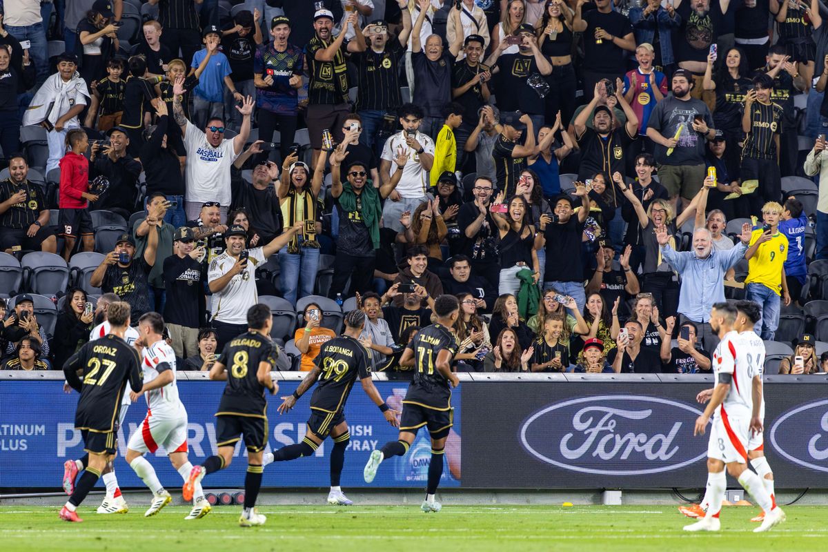 LAFC forward Denis Bouanga (99) celebrates with LAFC supporters during an MLS match against FC Dallas, Saturday July 12, 2025 in Los Angeles, Calif.
