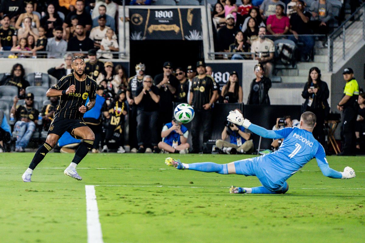 LAFC Forward Denis Bouanga (99) shoots the ball and scores in a game against the LA Galaxy, Saturday July 19, 2025 in Los Angeles, Calif.